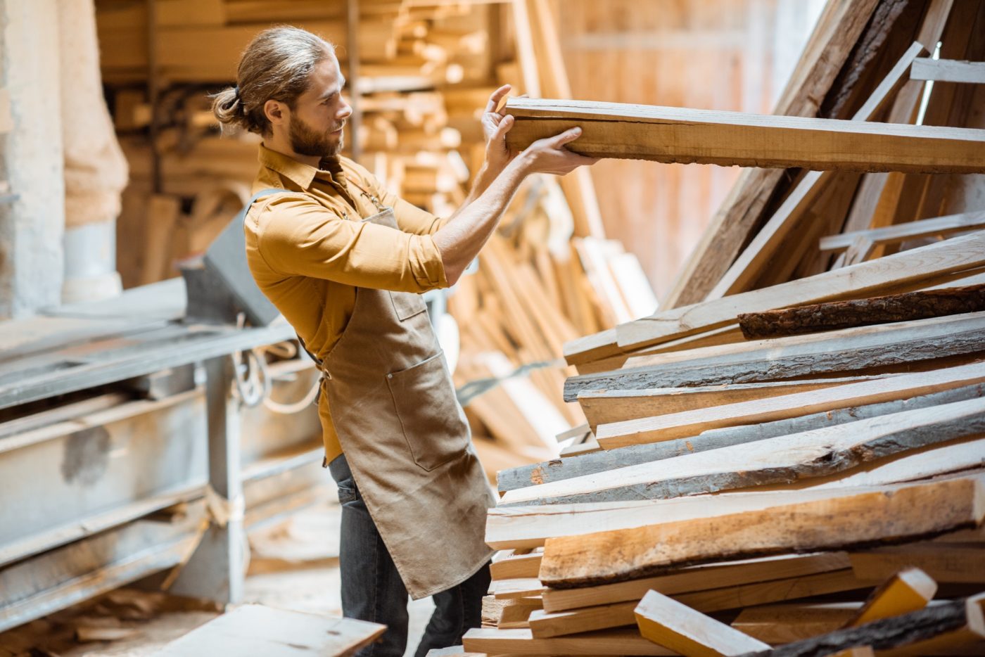 Carpenter at the wood storage
