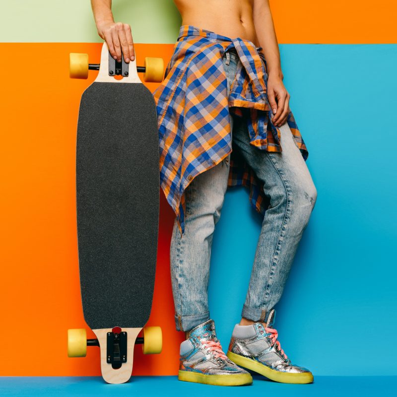 Skateboard Style fashion Girl. Minimal Design. Skateboard and ac