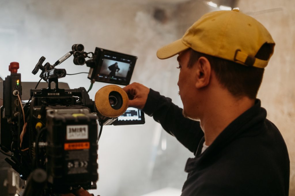 Cameraman shooting on big cinema camera
