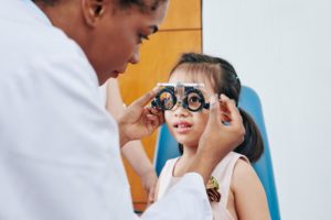 Girl visiting pediatric optometrist
