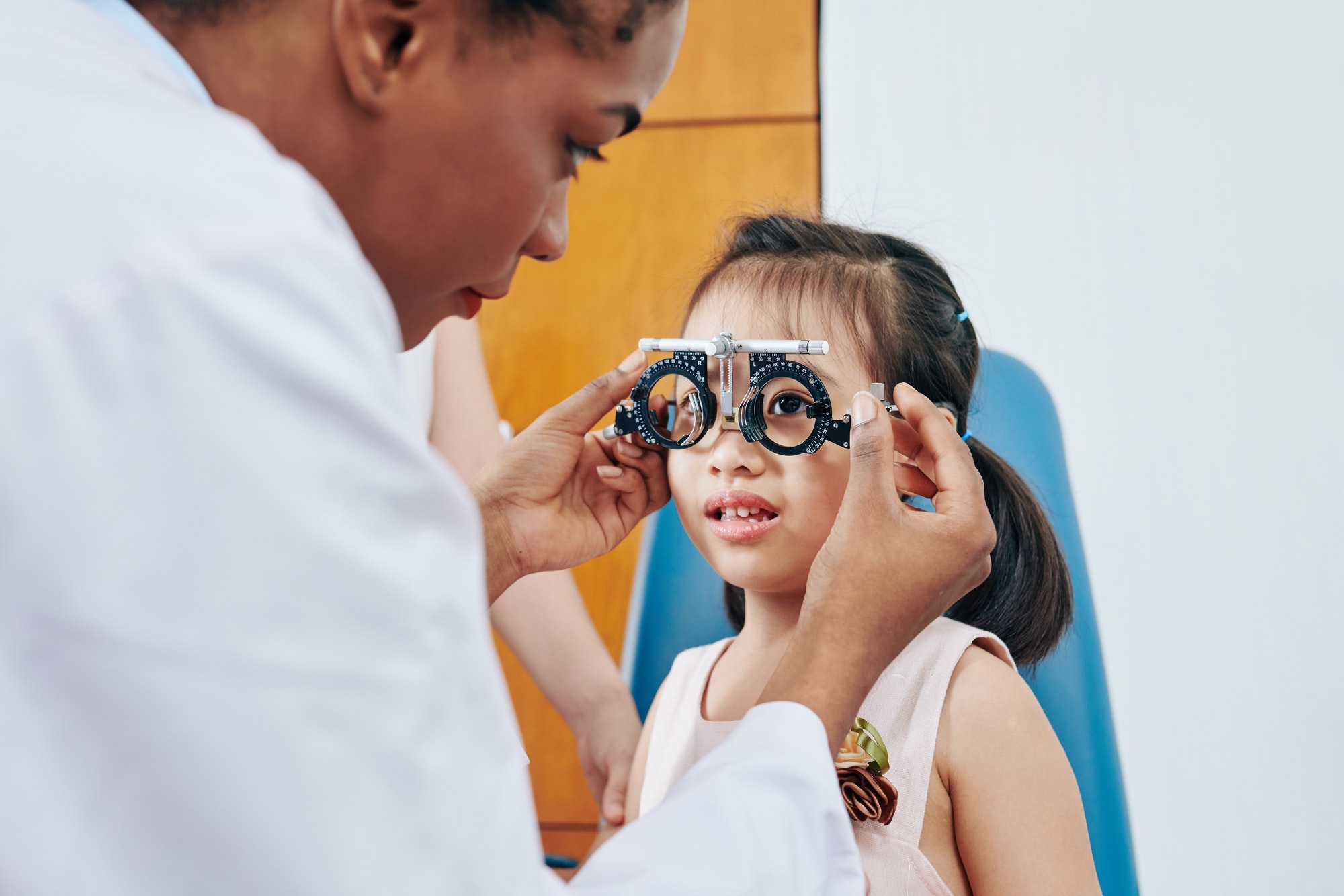 Girl visiting pediatric optometrist