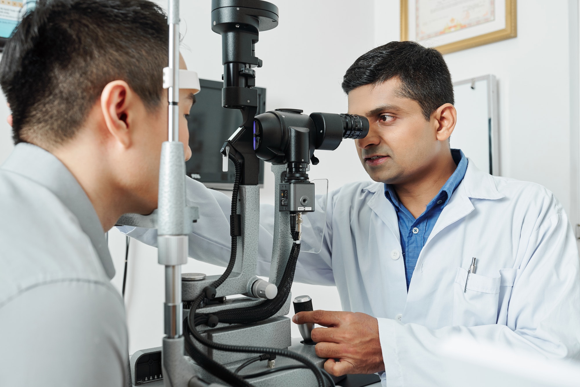 Optometrist examining the eyesight