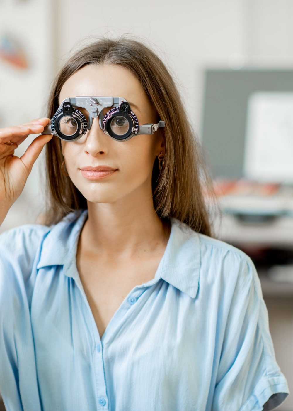 Young woman checking vision