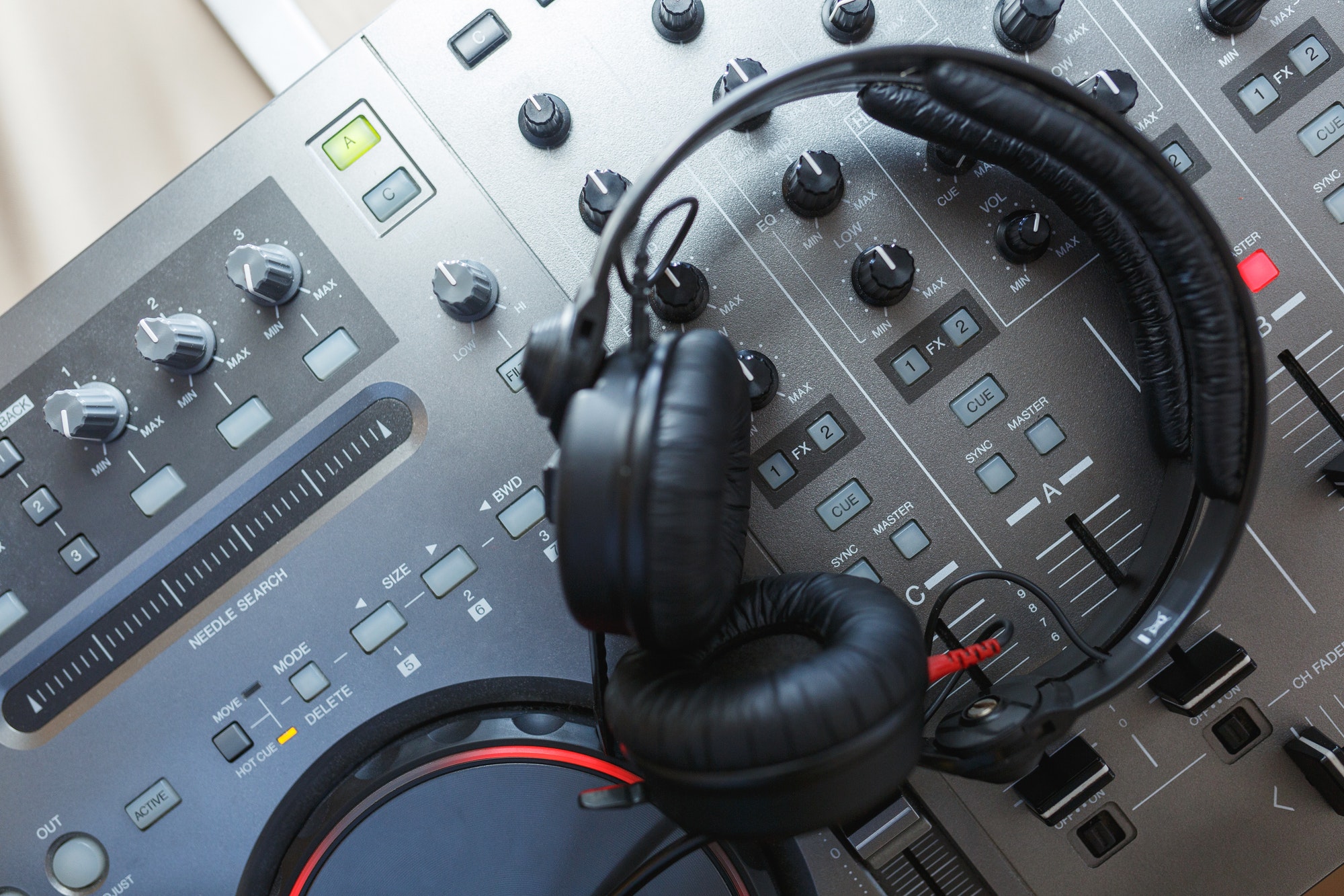 DJ Mixer with headphones.