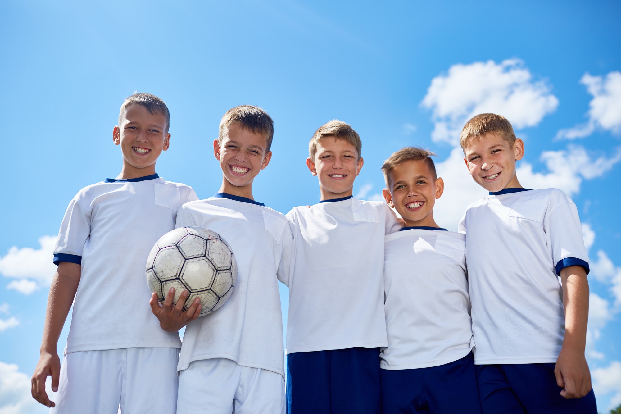 Happy Junior Football Team Posing