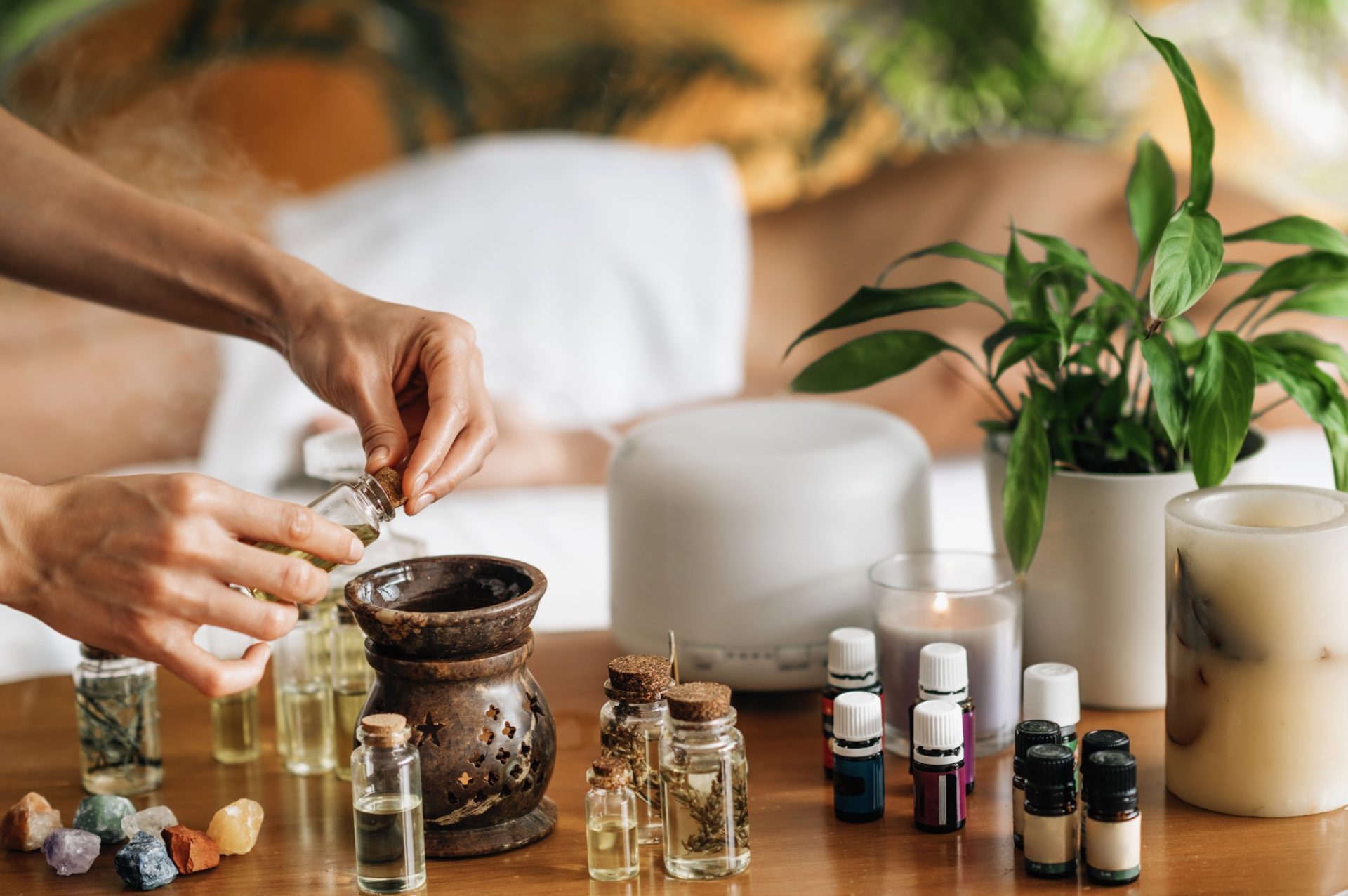 Ayurveda Aromatherapy Massage, Pouring Aromatic Oil in Essential Oil Diffuser