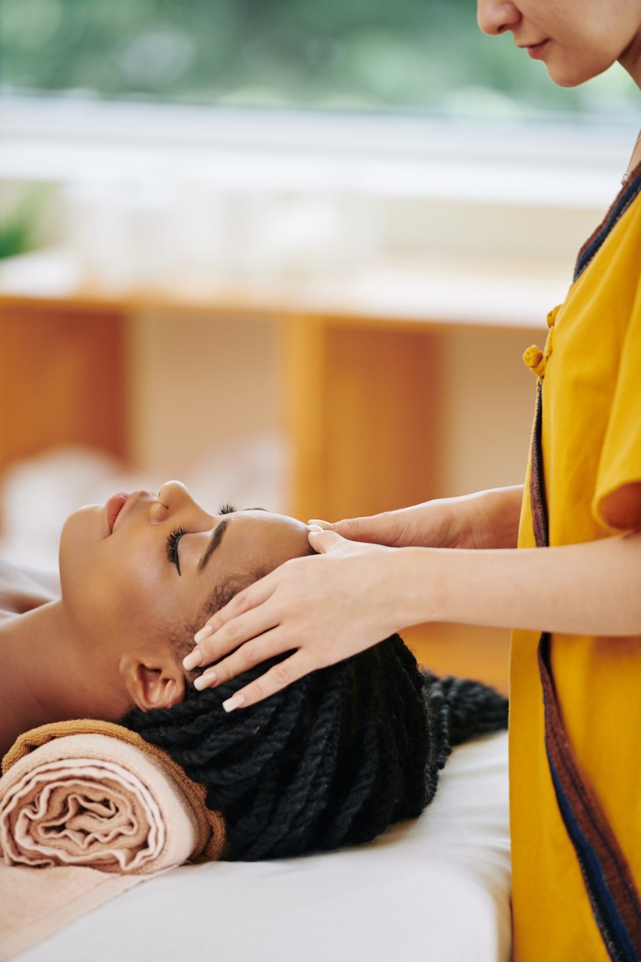 Head massage in spa salon