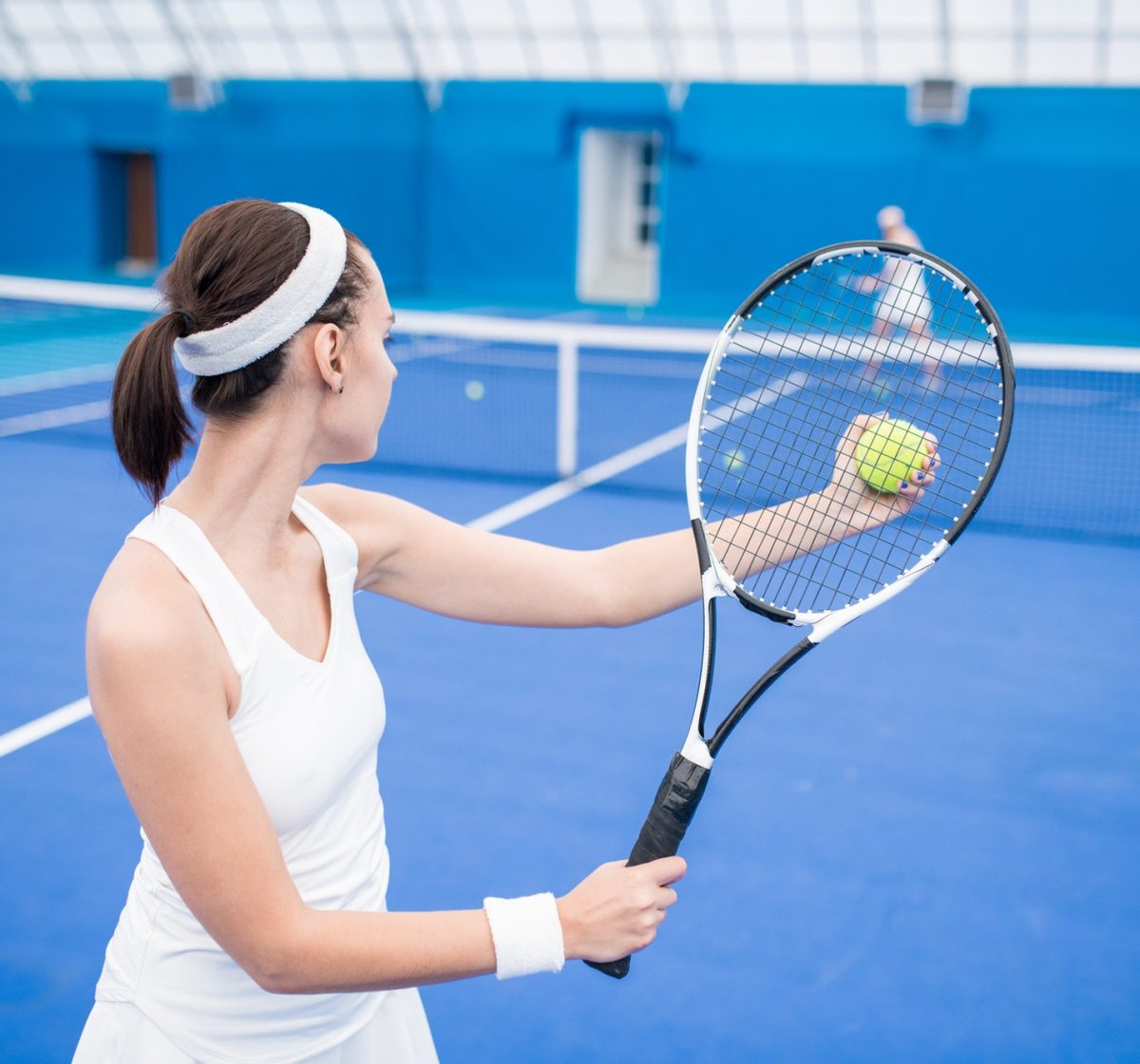 Female Tennis Player in Match