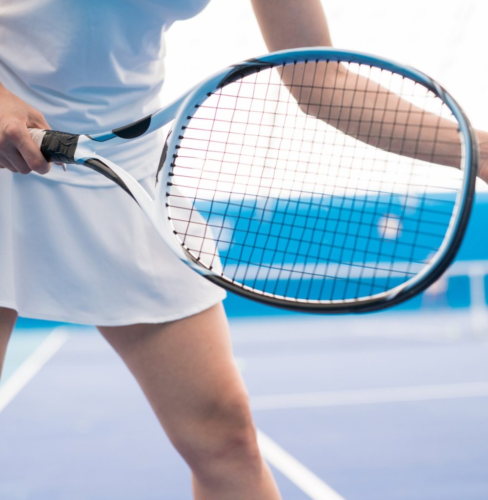 Woman Playing Tennis Closeup