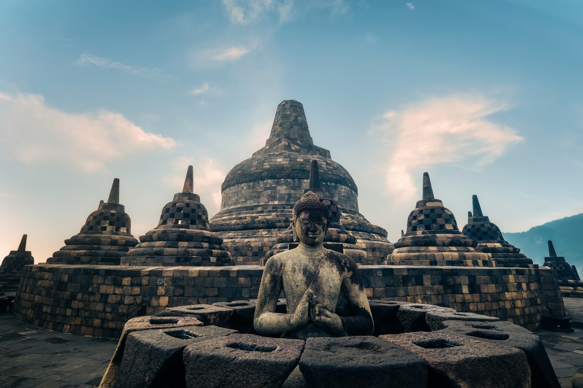 Statue of meditating Buddha. Borobudur temple. Java, Indonesia