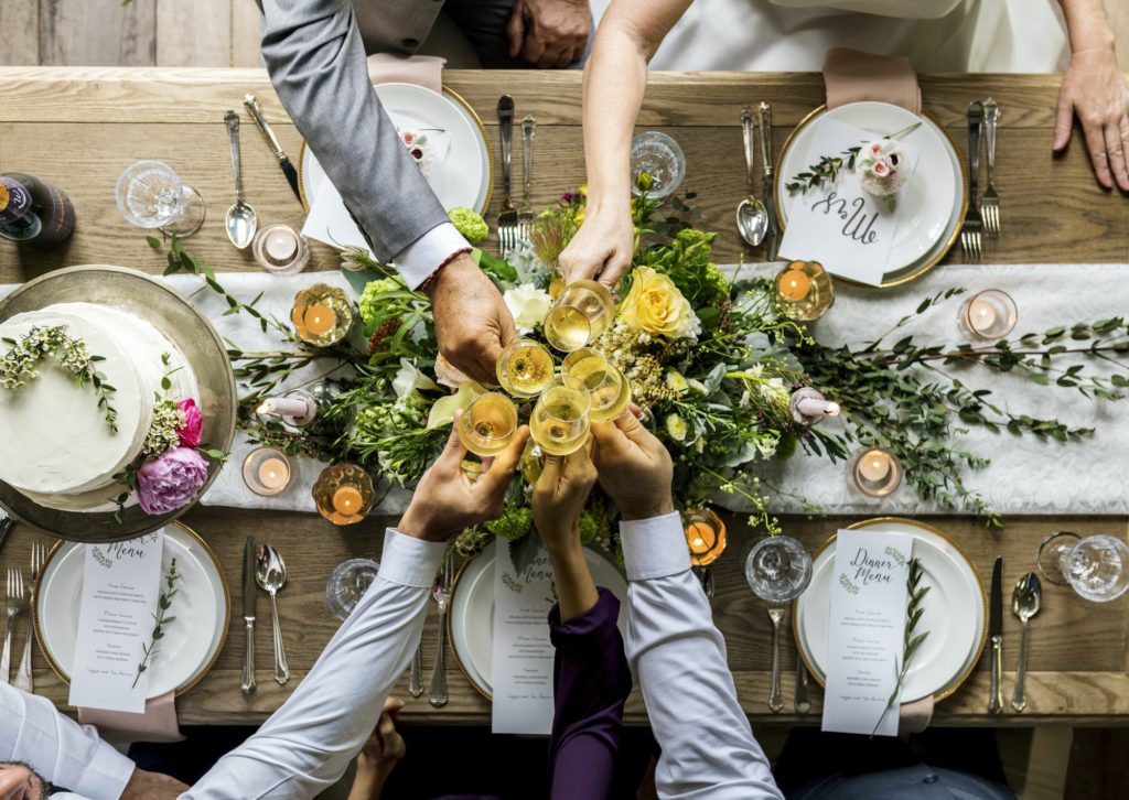 Group of Diverse Friends Clinging Wine Glasses Together