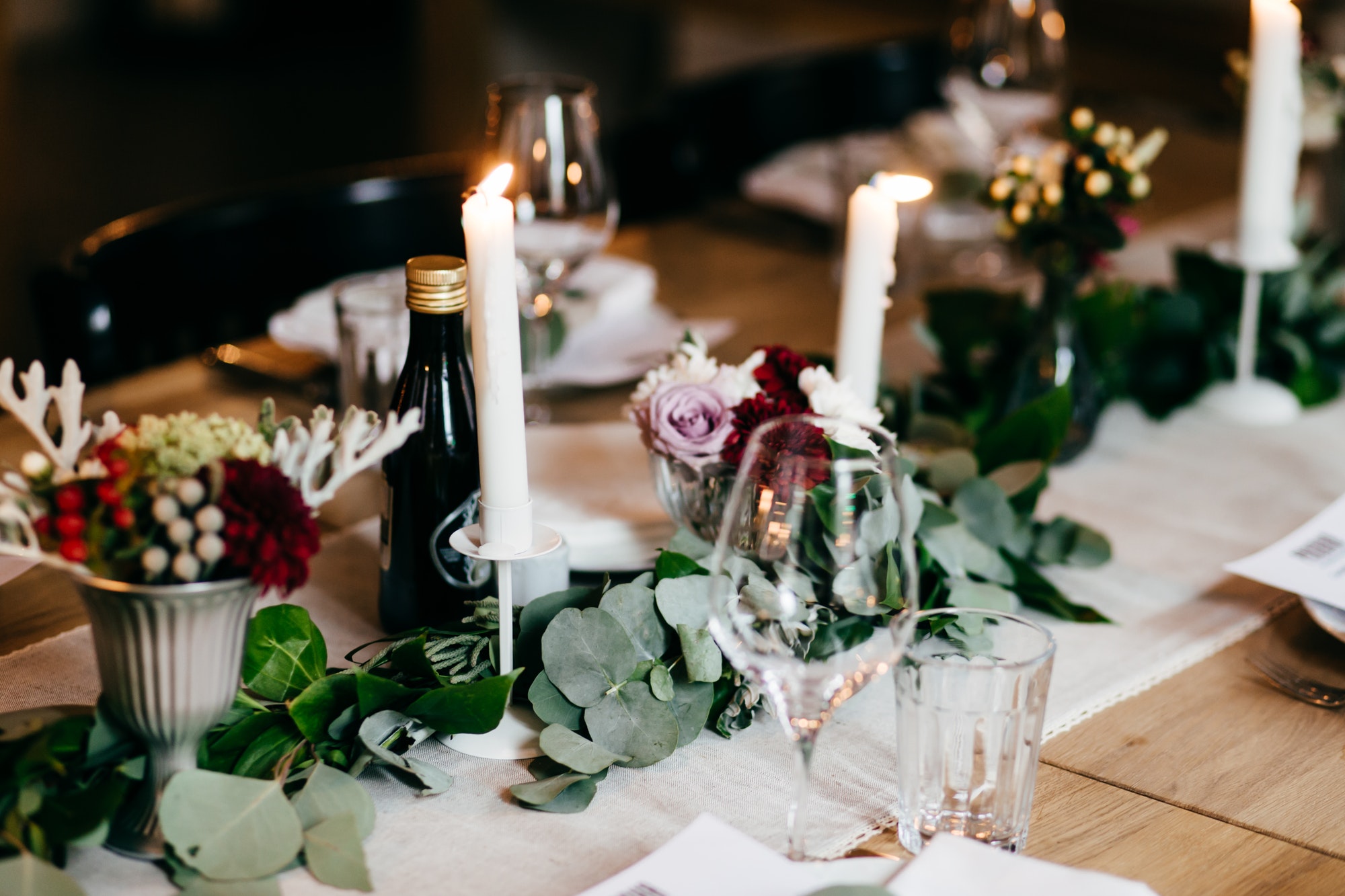 Wedding table decorated with flowers and candles. Table setting, selective focus