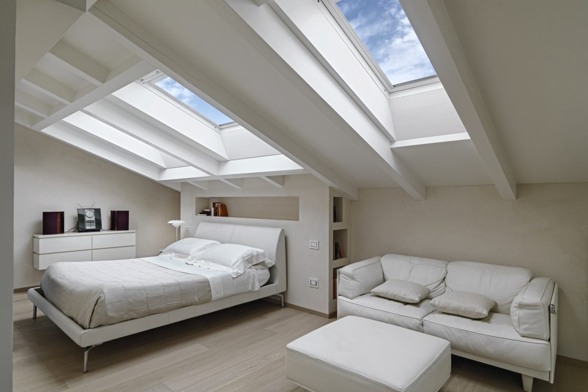 Interiors of the Modern Bedroom in the Mansard